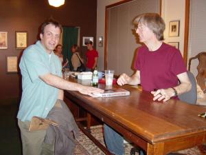 Grateful Web writer Tony Casson shakes hands with Phil