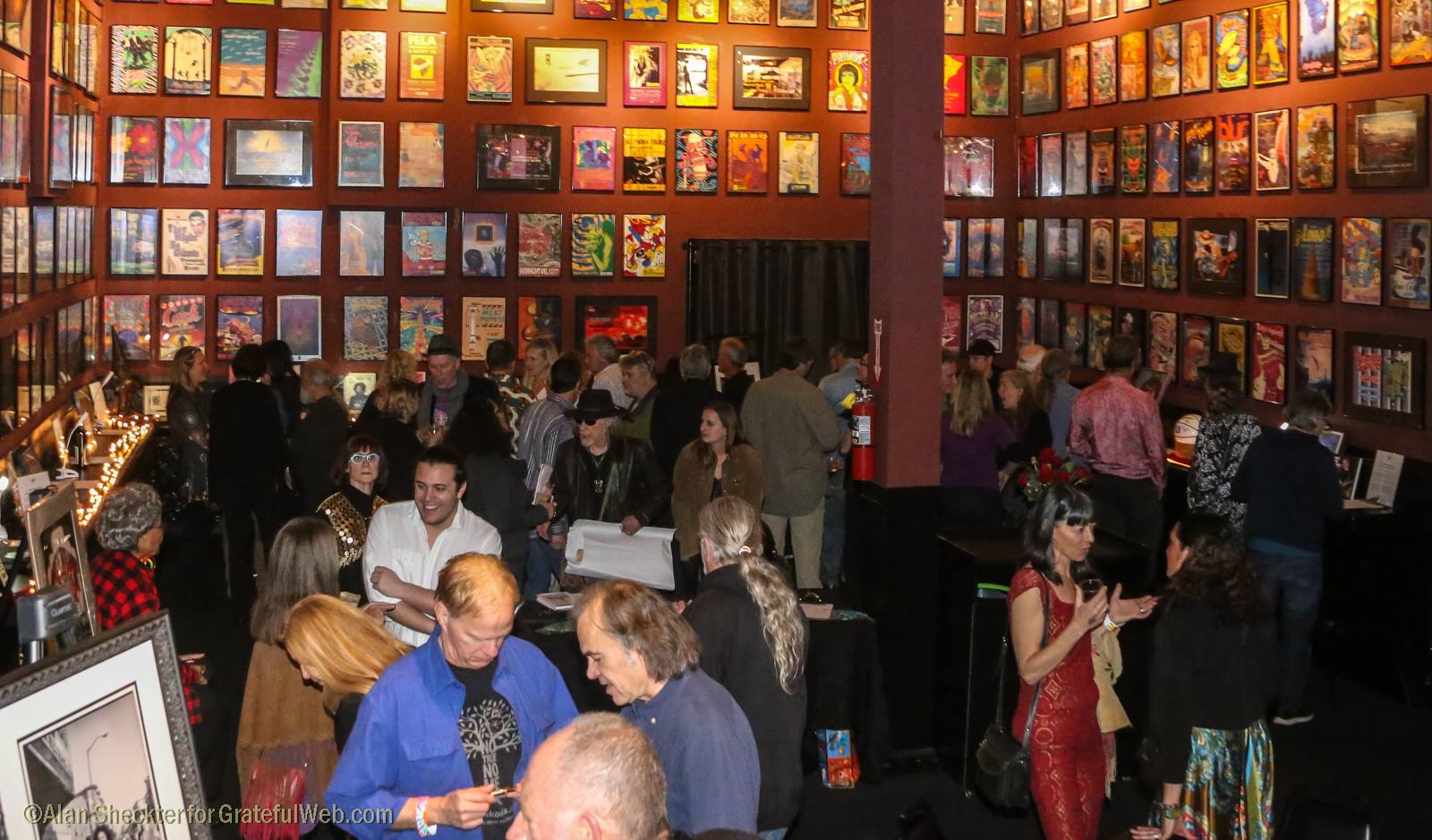 Attendees mingle around the second-floor silent auction for the Rex Foundation | The Fillmore