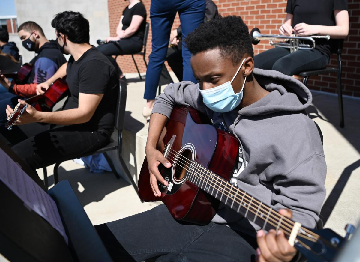 Above: John Overton High School students in Nashville, TN enjoy new Epiphone acoustic guitars in their music class.