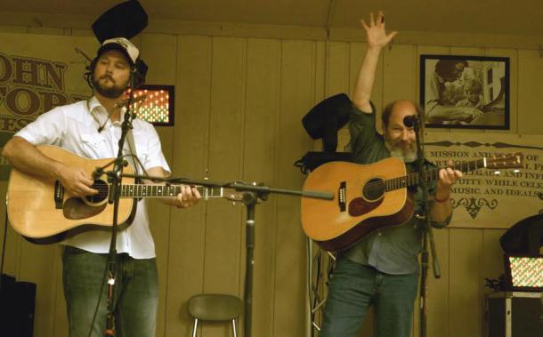 Eric Lambert (right) performs at JHMF with Chicago Farmer