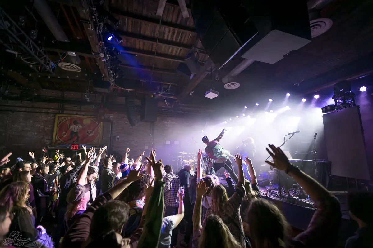 Producer Derek VanScoten takes a photo with the audience | Brooklyn Bowl
