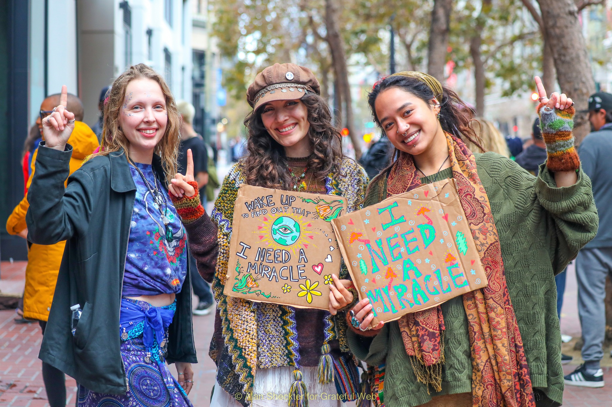 Dairian (from left), of Fort Worth, Texas, and Aiana and Sierra, both of Orange, California, look for tickets