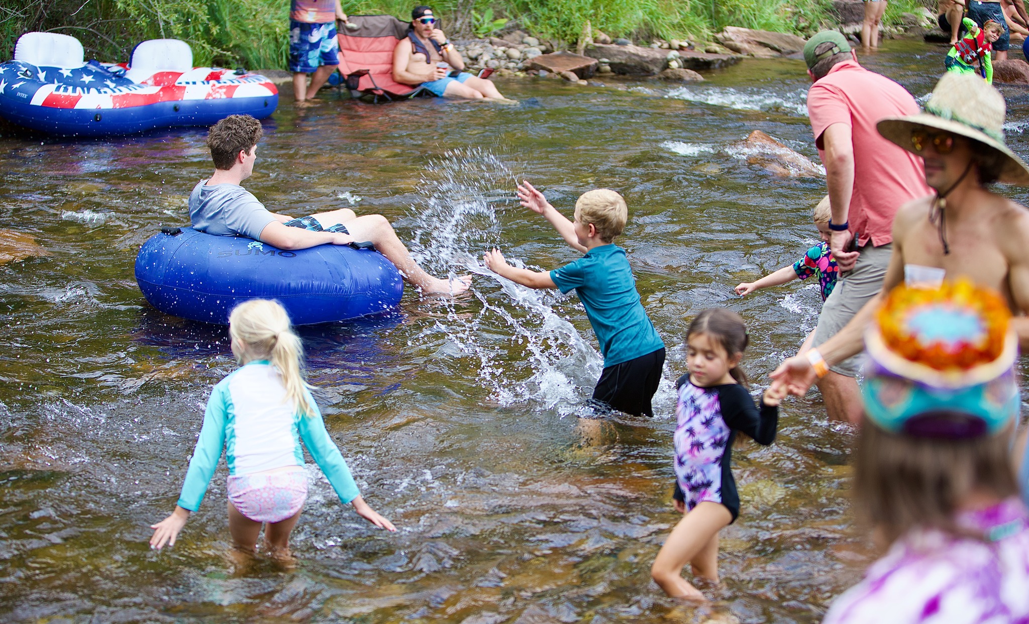 Playing in the river at RockyGrass