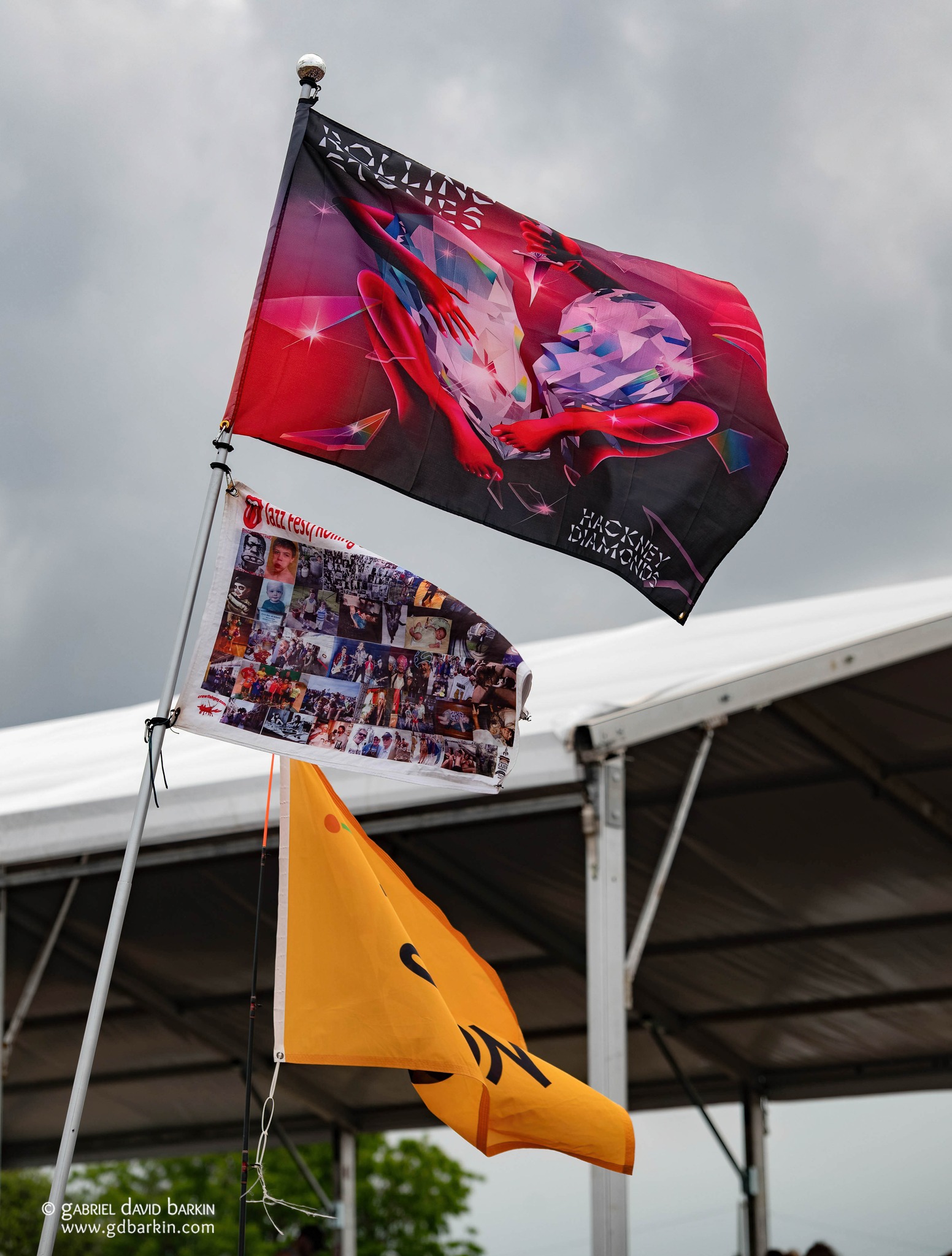 The Rolling Stones fans waving their flags wide and high