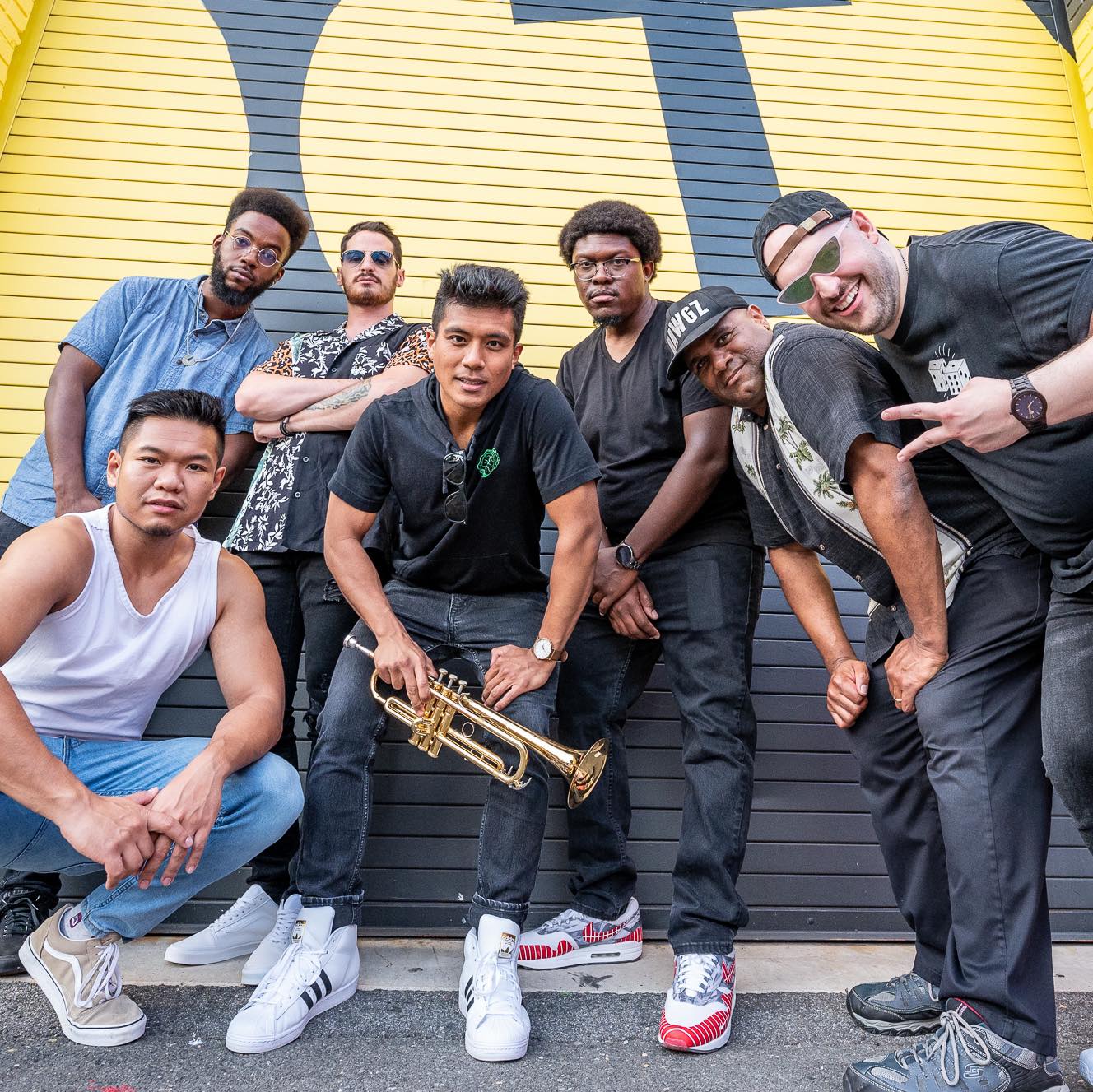 Funky Dawgz (L-R): Jon Singanam (Drums), Aaron Eaddy (Trumpet), Tommy Weeks (Saxophone), Chris Chhoeun (Trumpet), Colin Walters (Alto Saxophone), Marvin McNeill (Trombone), Mike Marsters (Trombone). Photo: Chris Quinn