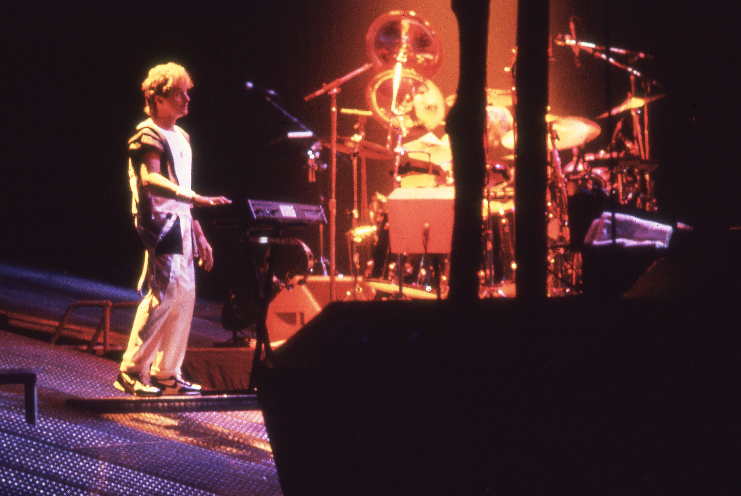 Jon Anderson of Yes multi-tasking on a Korg synth, in tandem with drummer Alan White, live in 1984 | Photo: Sam A. Marshall | Cincinnati OH