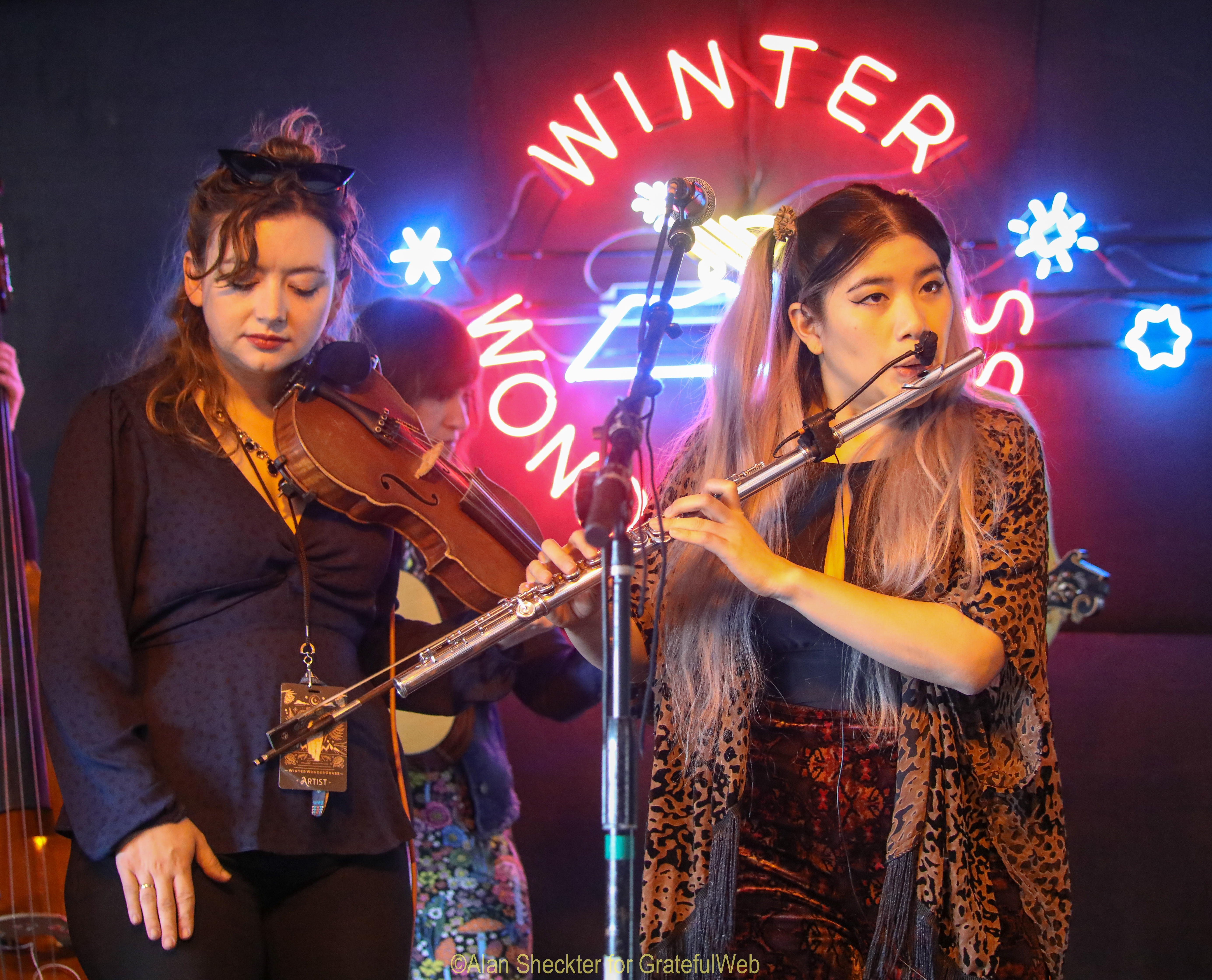 Twisted Pine’s Kathleen Parks (left) and Anh Phung perform with the WWWonderWomen