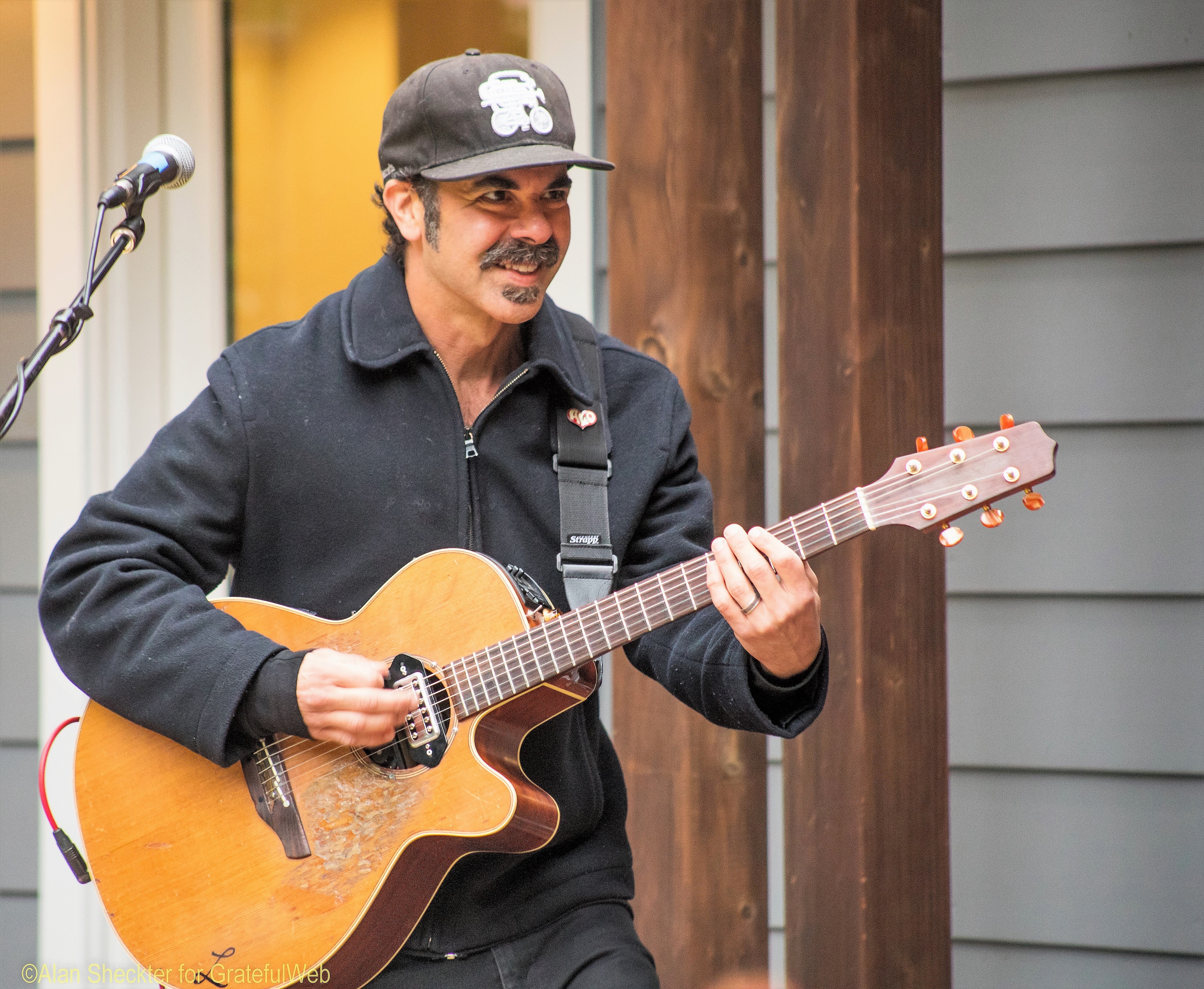 Lebo and his trusty Takamine guitar