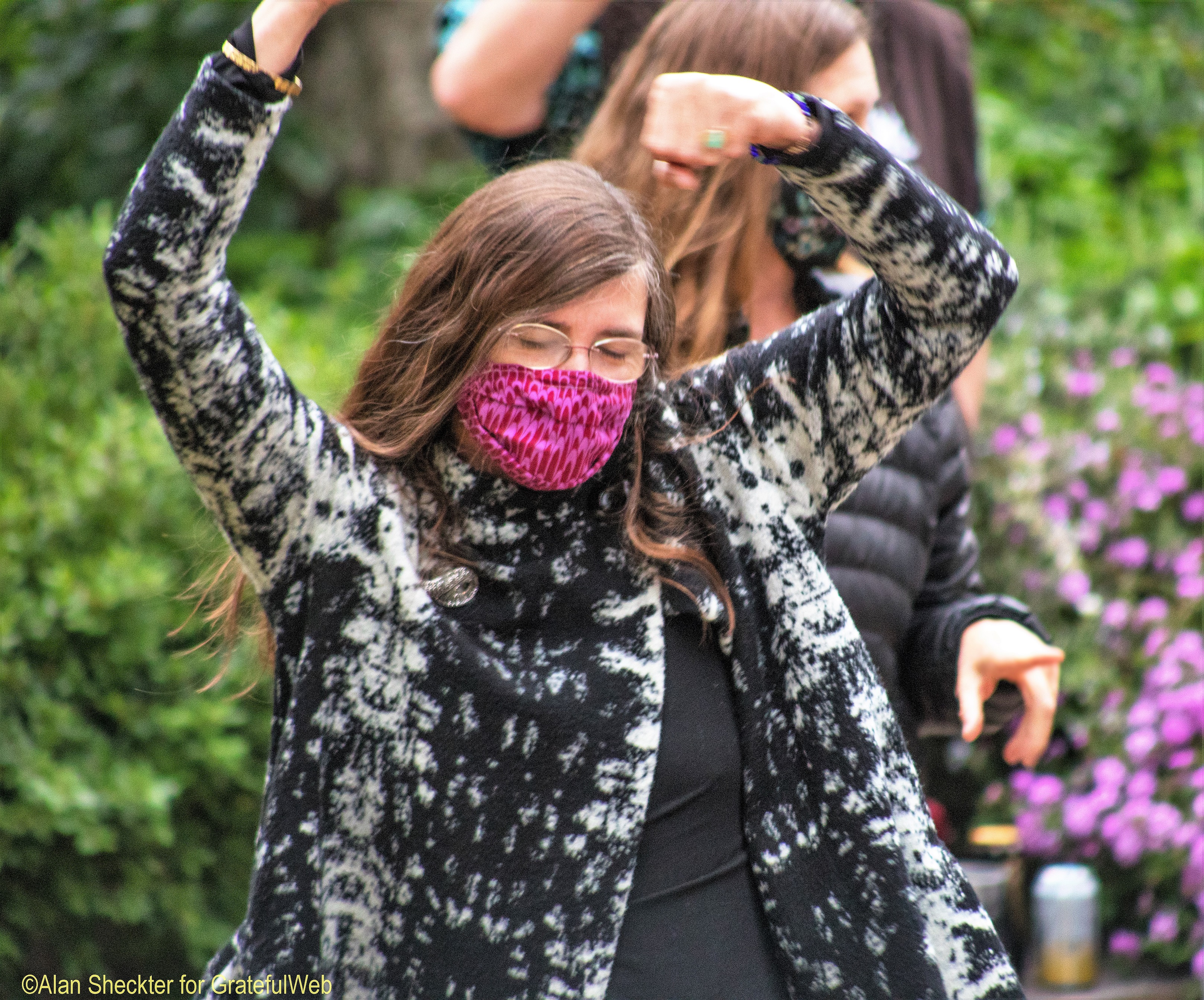 Masked up and happy to dance