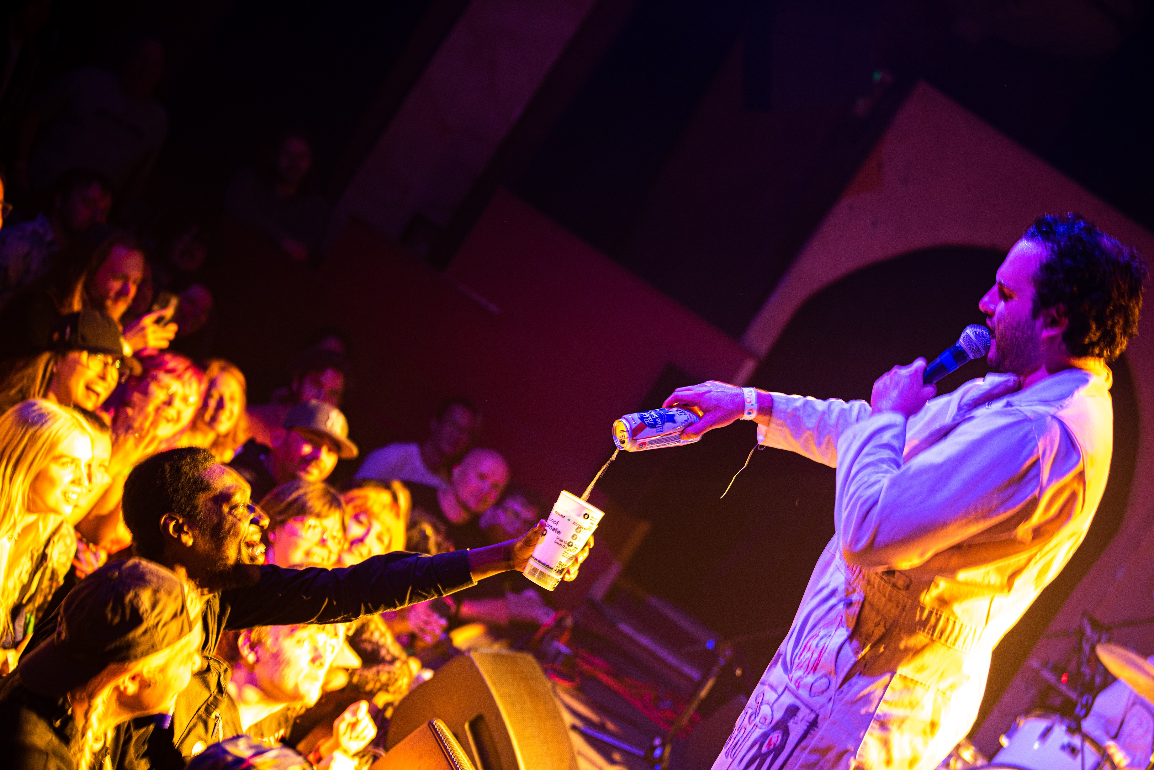 Lucas filling up a fan's cup | Bluebird Theater