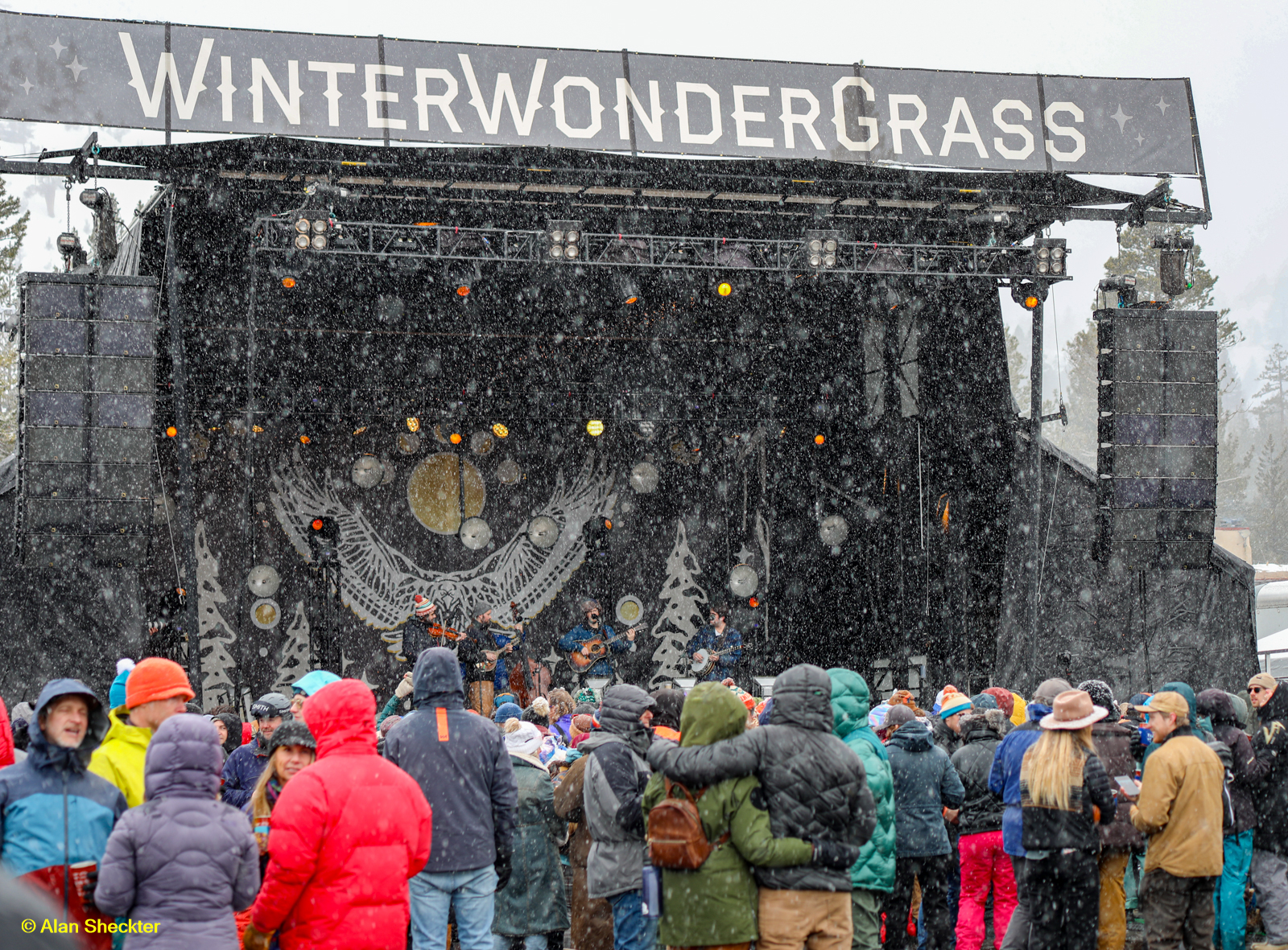 Mighty Poplar performs in a steady snowfall on Friday