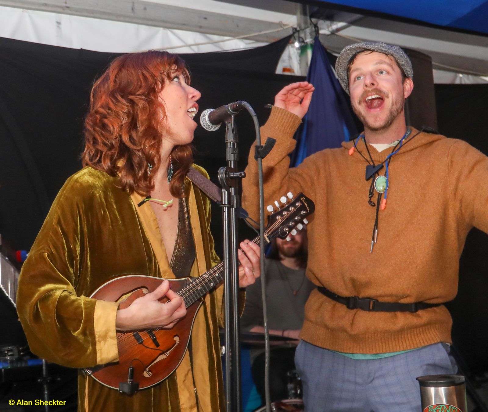 Jess Stoll (left) and Caleb Sanders of Boot Juice during an impromptu VIP-tent set on Saturday