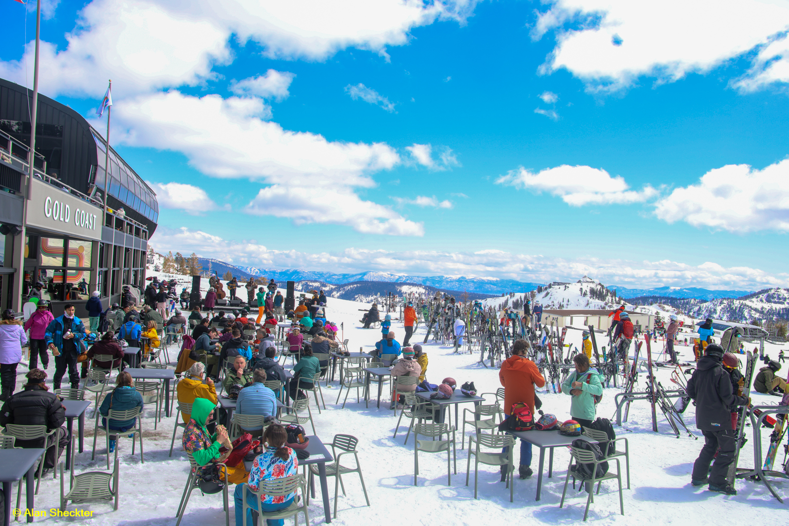 Caltucky performs for skiers and snowboarders at the top of the Gold Coast ski trail on Sunday