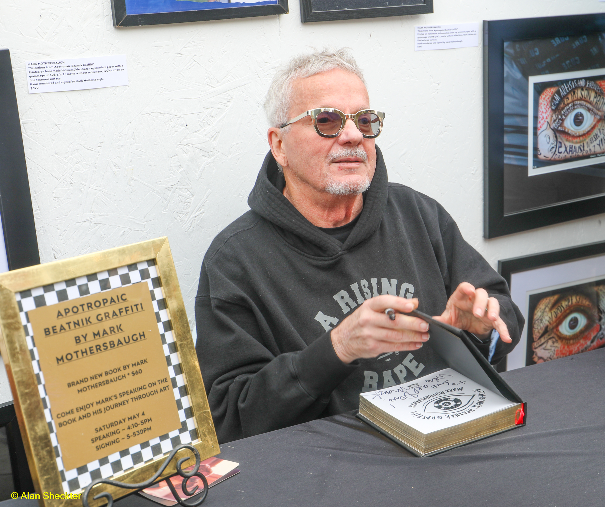 Mark Mothersbaugh signs a copy of “Apotropaic Beatnik Graffiti”