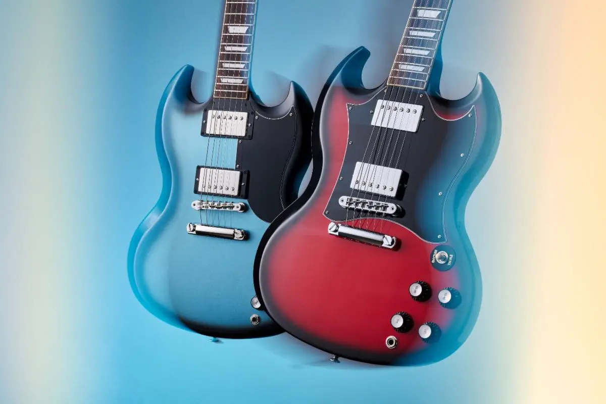 Above (L-R): the Gibson Custom Color Series SG Standard ’61 in Pelham Blue and the Gibson SG Standard in Cardinal Red.