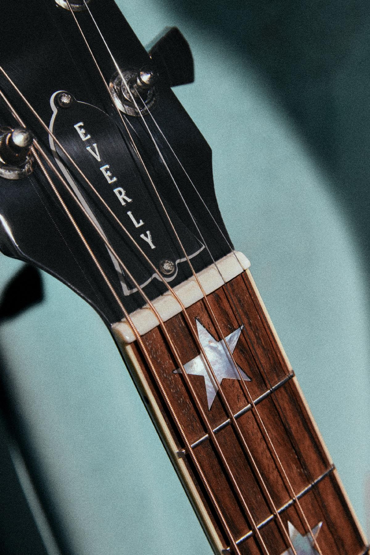 Gibson Everly Brothers J-180 mother of pearl star inlays on the fretboard and headstock.