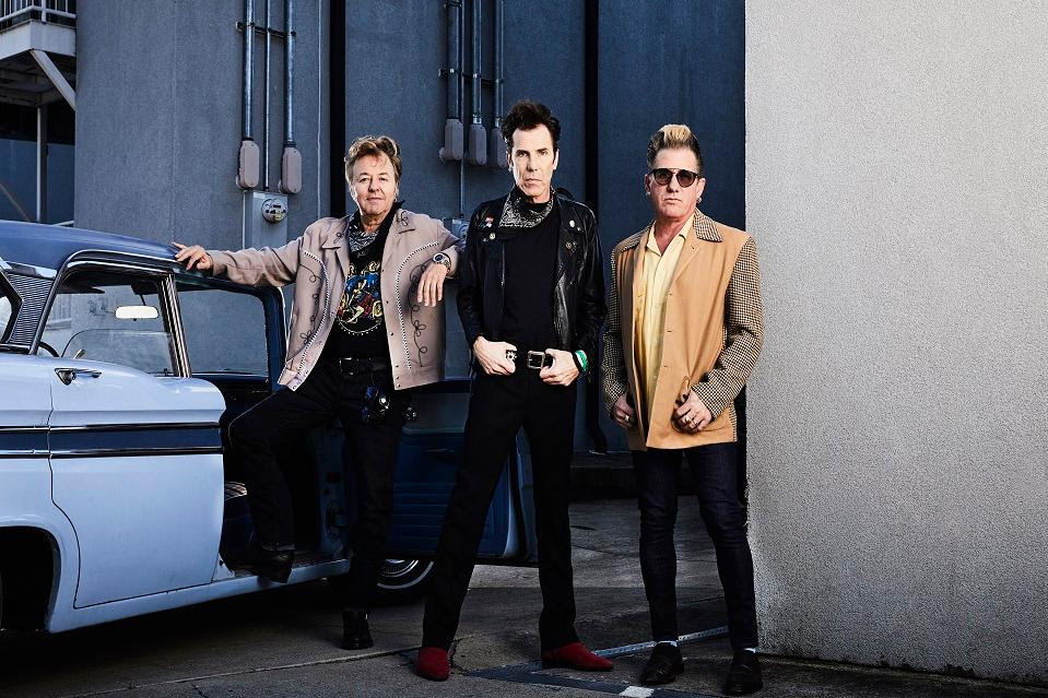 The Stray Cats from L-R: Brian Setzer, Slim Jim Phantom, Lee Rocker, By Russ Harrington