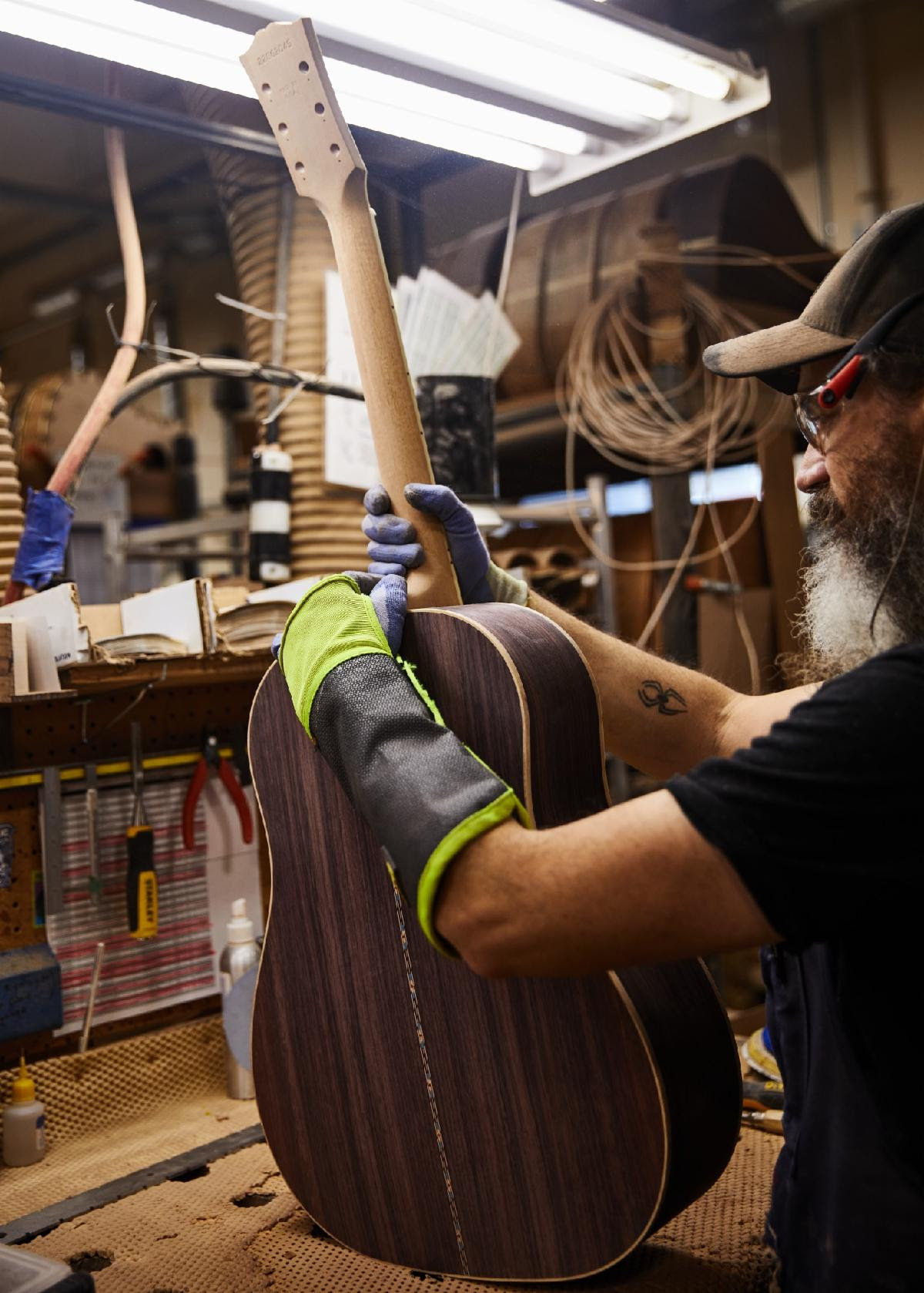 Above: an artisan neck fits a J-45 Deluxe Rosewood. - photo credit: Gibson