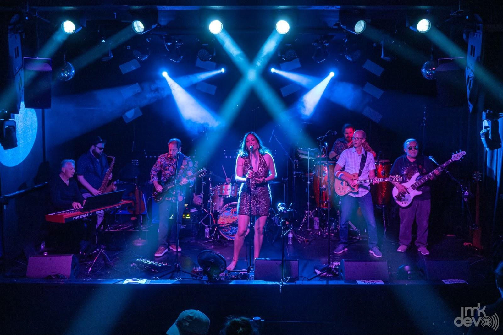 Red Matter (L-R): Doug Knight (keys), Matt Kampe (guest artist - sax), Geoff Schneider (guitar, vocals), JP Goeghegan (drums), Milo Barer (vocals), Aaron Hagele (percussion, vocals), Paul Dunay (guitar), Ric Lubell (bass). 
