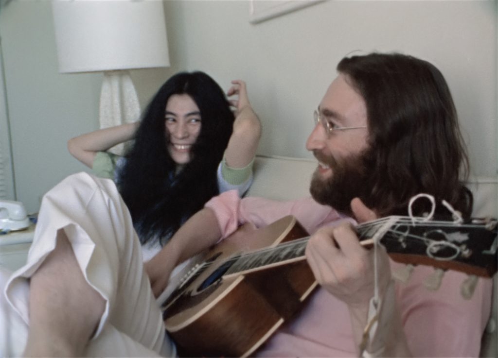 John Lennon & Yoko Ono Lennon's Legendary Peace Anthem "Give Peace A Chance" Revealed In New Never-Before-Seen Video