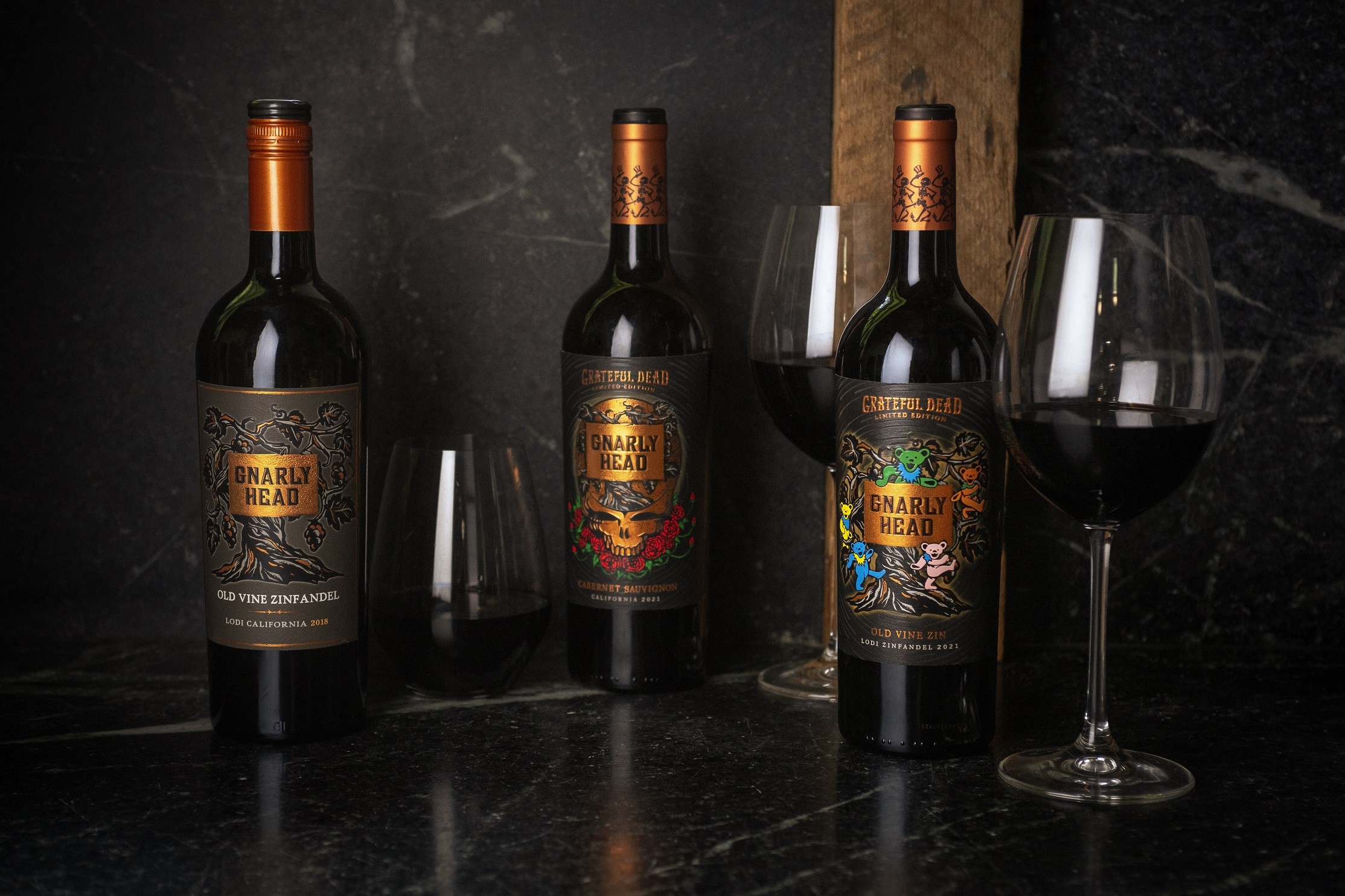 The Dead&rsquo;s Iconic Dancing Bear and Lightning Bolt-Skull Motifs Featured on Collectible Bottles 