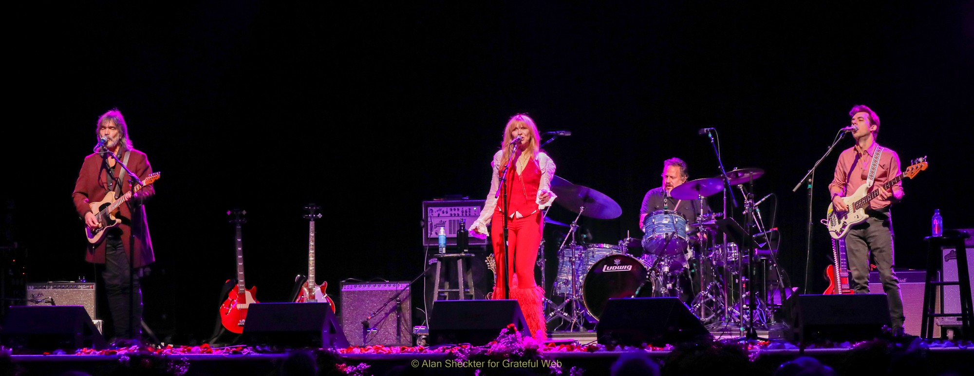 Larry and Teresa with Justin on drums and Brandon Morrison on bass
