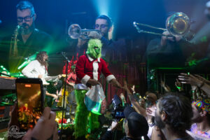 Holiday Covers, Deep Jams, and Guest Horns Open Dogs in a Pile’s Ardmore Stand