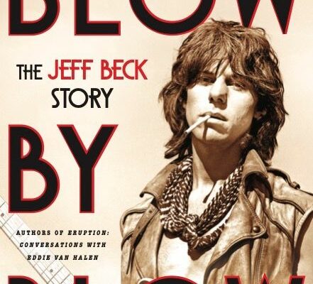 Poster for "Blow by Blow: The Jeff Beck Story" featuring a guitarist in a leather jacket smoking, with bold red title text across the image and authors listed at the top.