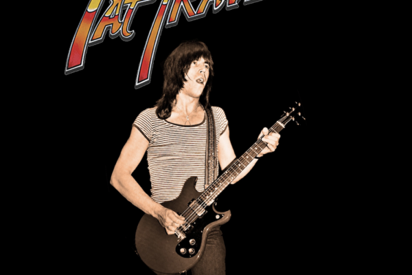 Promotional poster featuring Pat Travers with a bass guitar on a black background; the 'PAT TRAVERS' logo dominates the top and red text at the bottom reads 'HIGHWAY 61 REVISITED Live in Houston, TX - March 20, 2004'