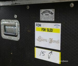 Close-up of a black textured equipment case with a metal Spectrum Case plate showing serial number 14017 and a left edge latch.