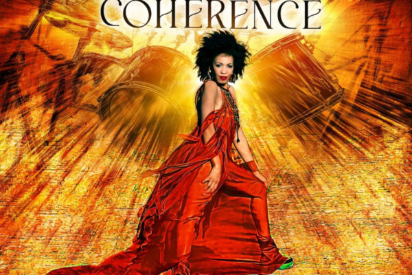 Promotional poster for Coherence featuring a woman in a flowing red dress walking forward against a fiery orange drum-themed background.