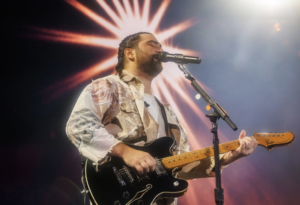 Noah Kahan’s momentum continues with major milestones, a sold-out world tour, and one of the year’s biggest albums