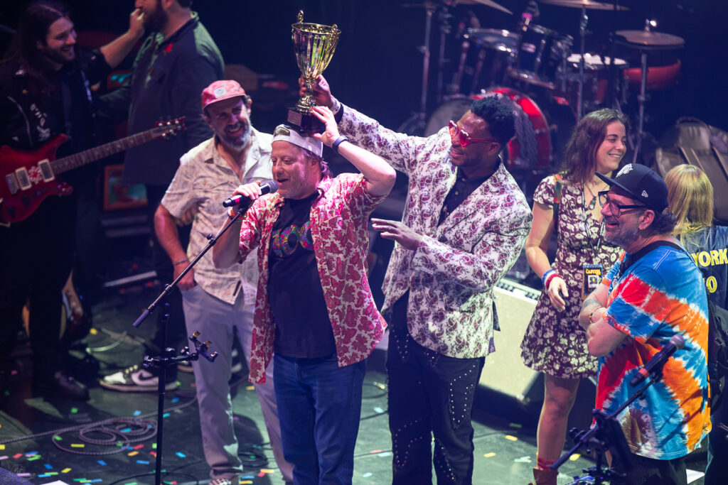 Peter Shapiro is flanked by Robert Randolph, Marc Brownstein, and Al Schnier